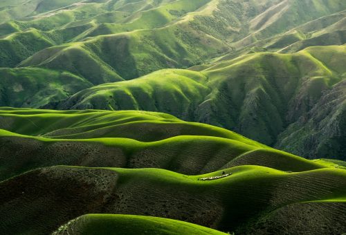 bird's eye view photograph of green mountains